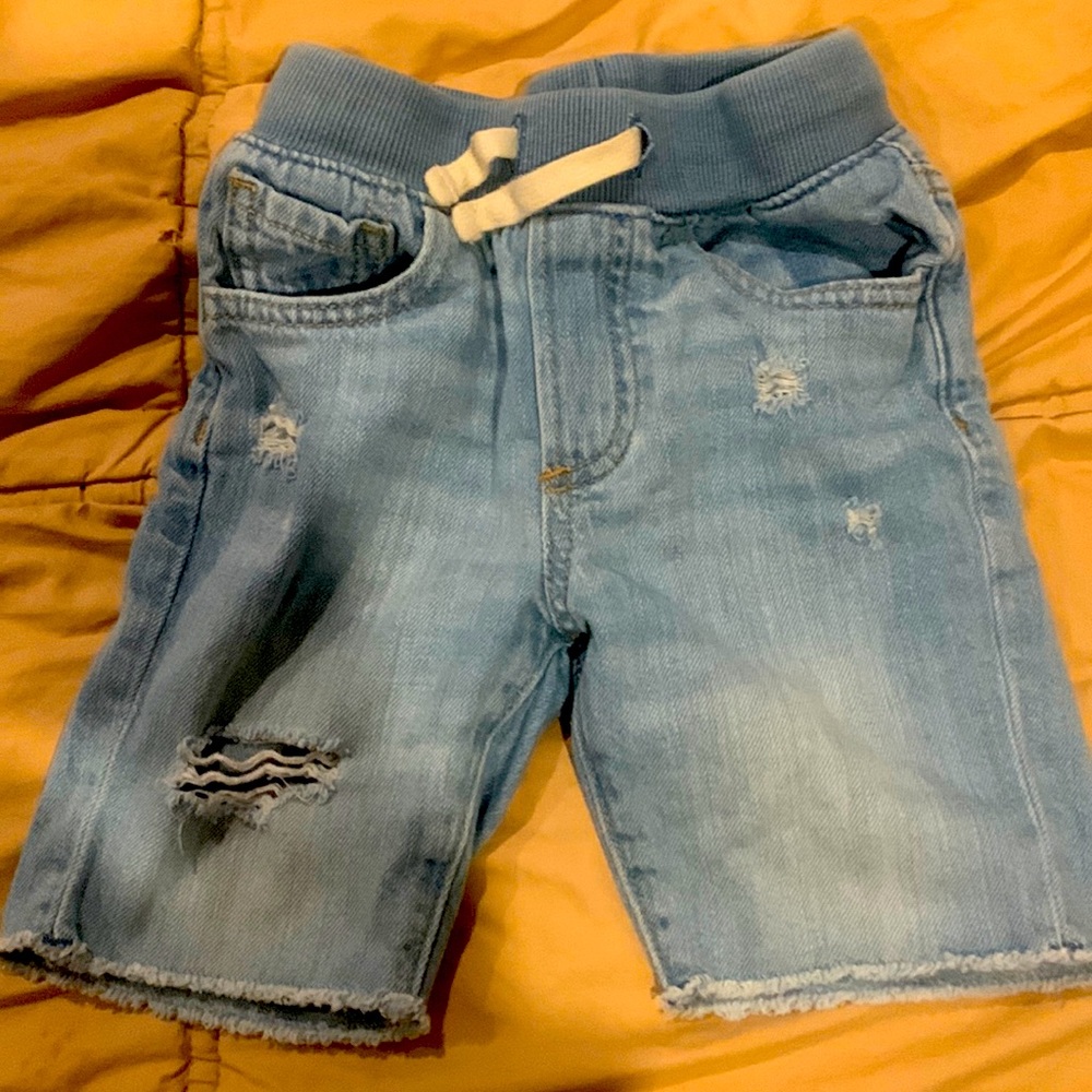 Distressed denim shorts